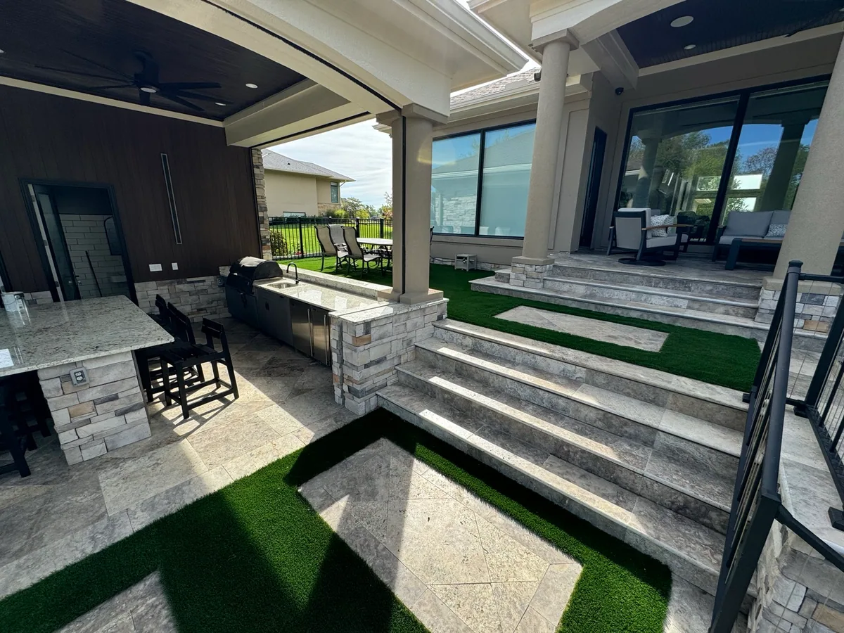 Commercial turf amenity space completed by Queen City Hardscapes