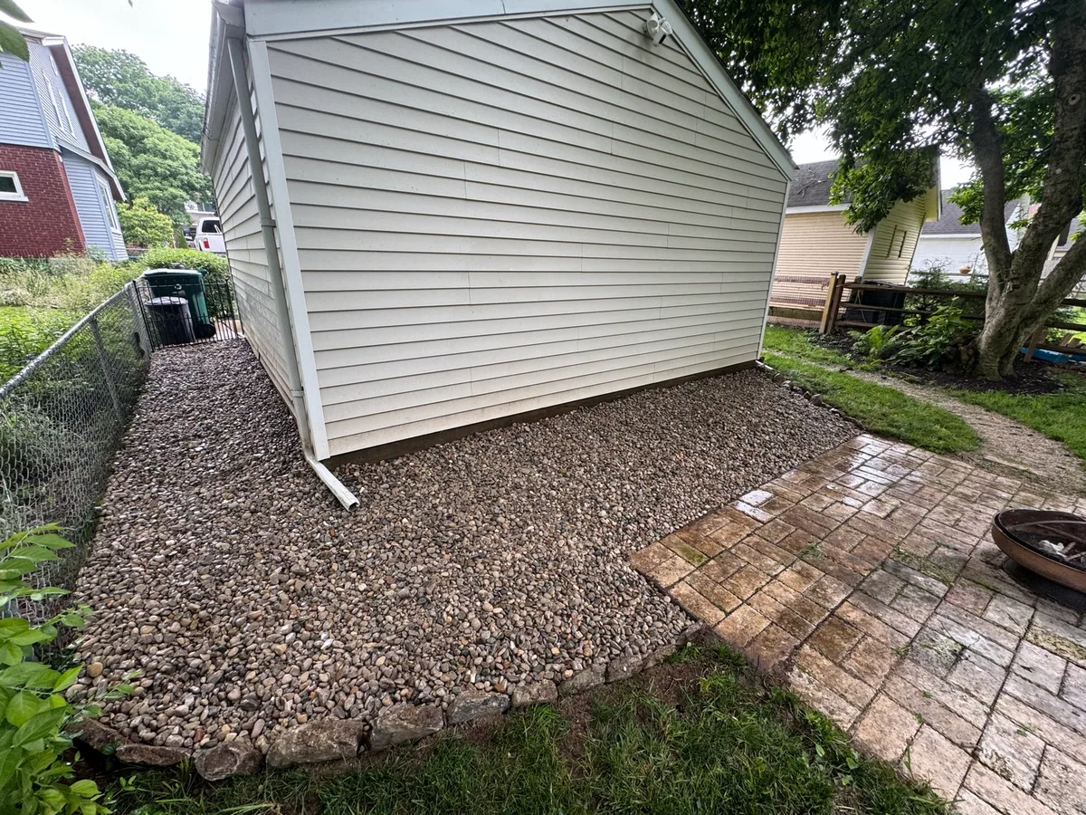 Drainage gravel bed completed by Queen City Hardscapes