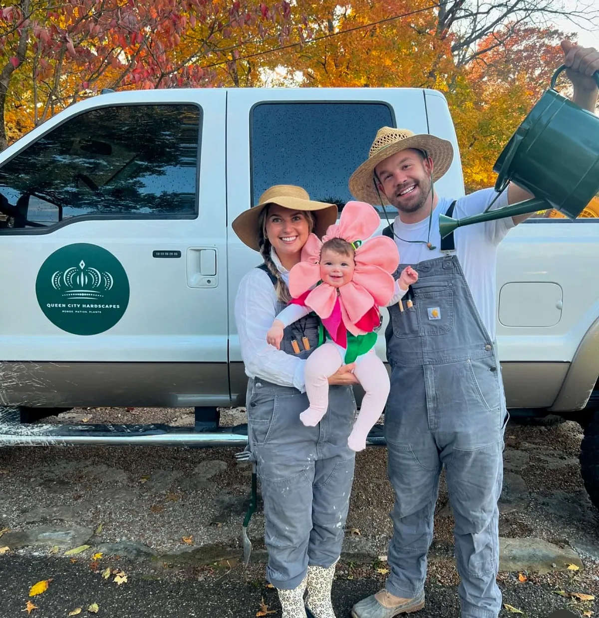 The Queen City Hardscapes family beside their company truck