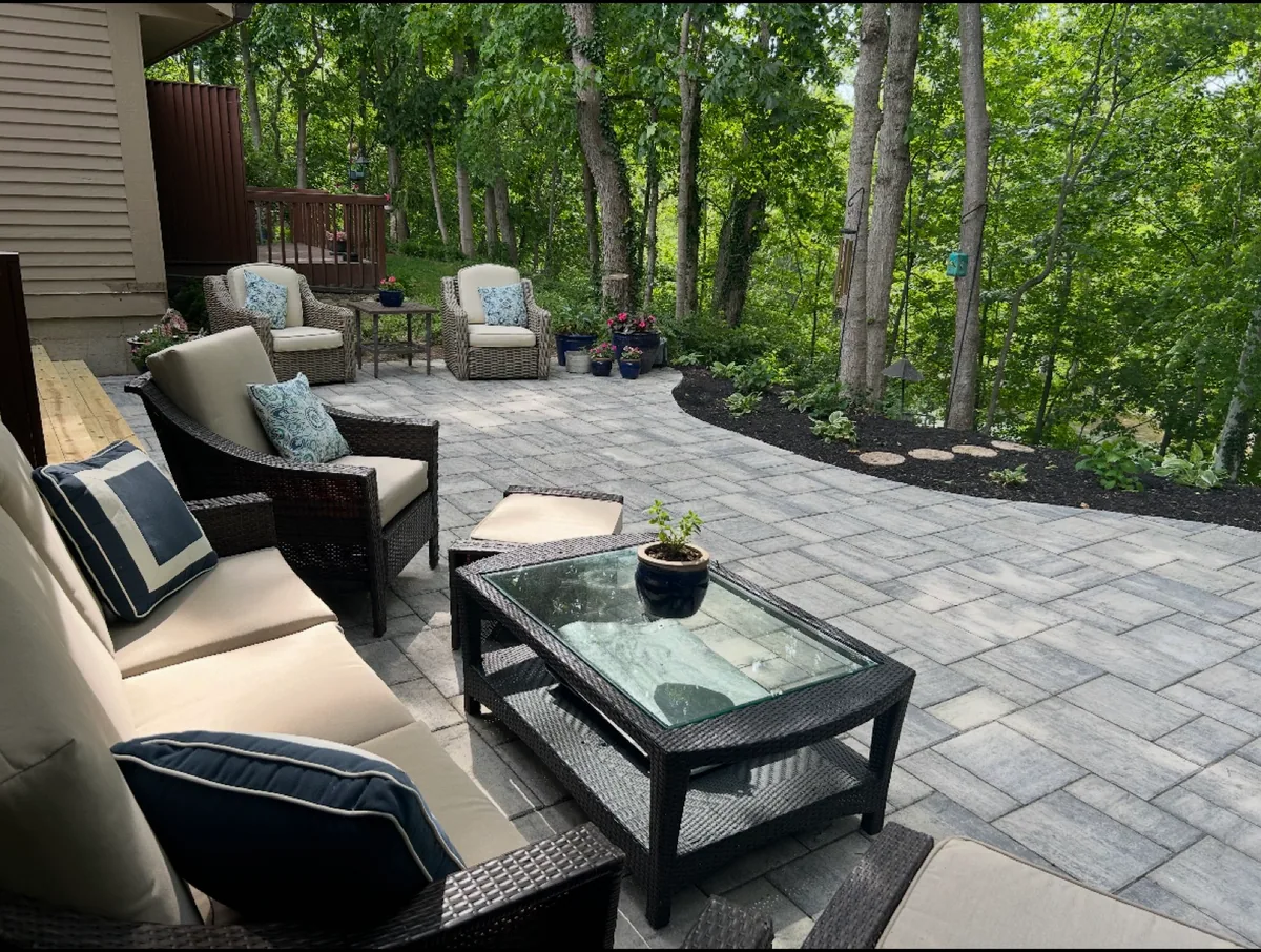 Wooded paver patio completed by Queen City Hardscapes